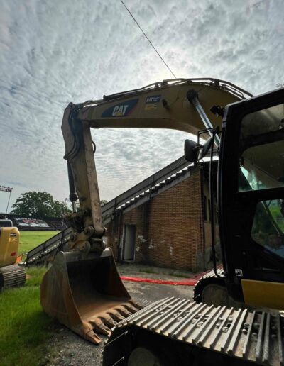 earth digger working on field