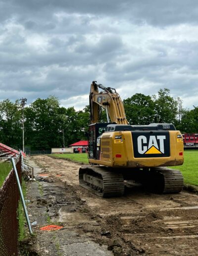 earth digger on field